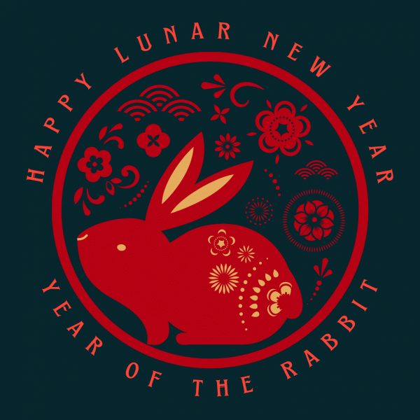 On a dark grey background, a red and gold illustration of a rabbit with flowers and text that reads "Happy Lunar New Year, Year of the Rabbit"