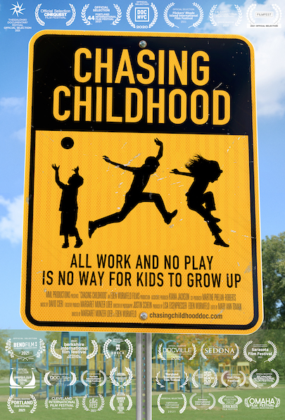 Yellow road sign that reads: Chasing Childhood