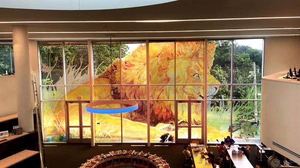 Window display of large lion artpiece