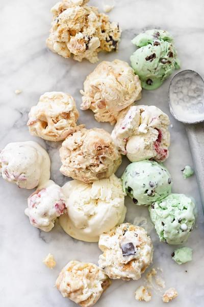 Image of various scoops of ice cream on a marble background