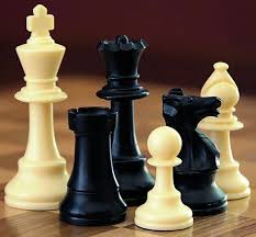 six chess pieces, three black and three white