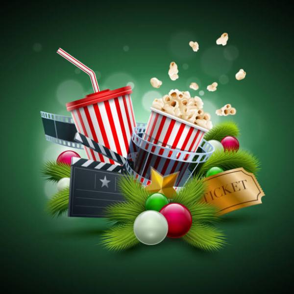 soda, popcorn, movie reel and gold ticket surrounded by holiday decorations