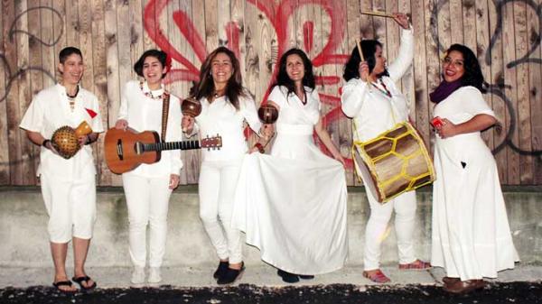 six musicians dressed in white
