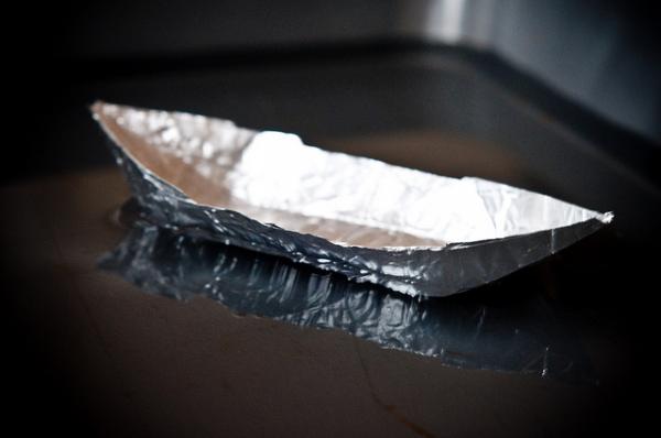 image of an small aluminum foil boat 