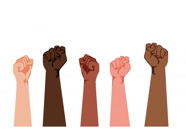 Five fists raised up with different skin tones