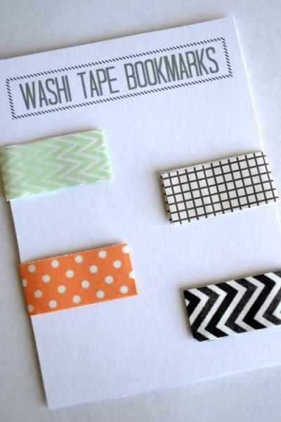 A white card that says WASHI TAPE BOOKMARKS with four examples of thin different colored bookmarks.